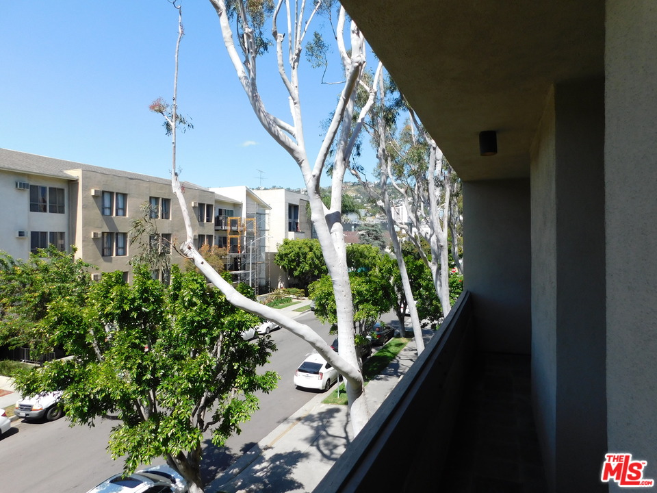 740 North Kings Road, Unit 201 Los Angeles, CA 90069 - Photo 9 of 20 a view of balcony and yard