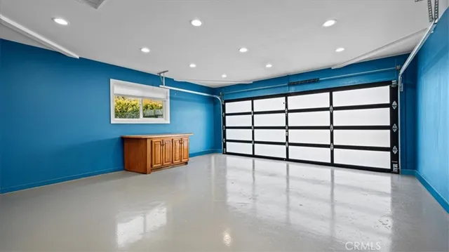 a view of a big room with windows