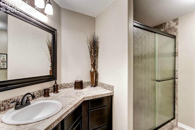 1085 Bowstring Road Monument, CO 80132 - Photo 21 of 28 Lower Level Full Bathroom