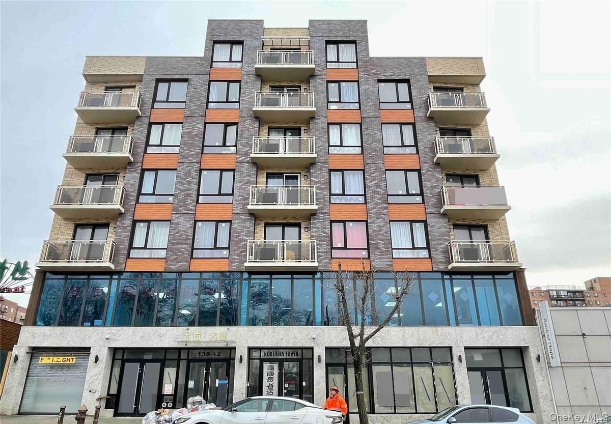 138-12 Northern Boulevard, Unit 6B Queens, NY 11354 - Photo 1 of 10 a front view of a multi story building