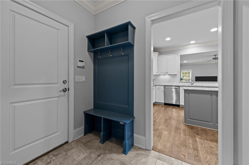 5103 Millstaff Drive Oak Ridge, NC 27310 - Photo 21 of 46 DROP ZONE INSIDE OF THE GARAGE IN THE MUD ROOM/HALL