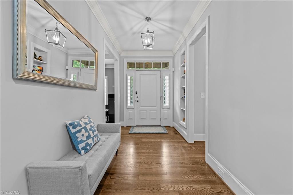 5103 Millstaff Drive Oak Ridge, NC 27310 - Photo 8 of 46 ENTRY LOOKING TOWARDS FRONT DOOR