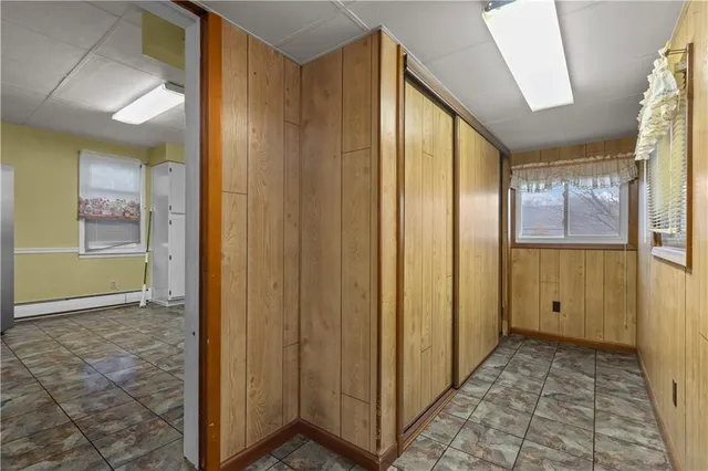 a view of a hallway with a glass door