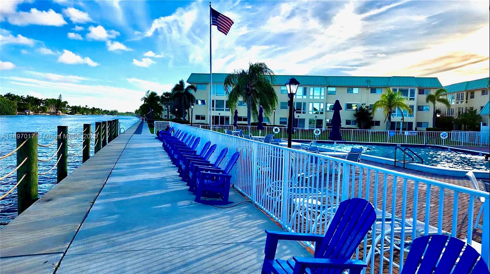 35 Colonial Club Drive, Unit 203 Boynton Beach, FL 33435 - Photo 20 of 29 a view of a balcony with wooden floor