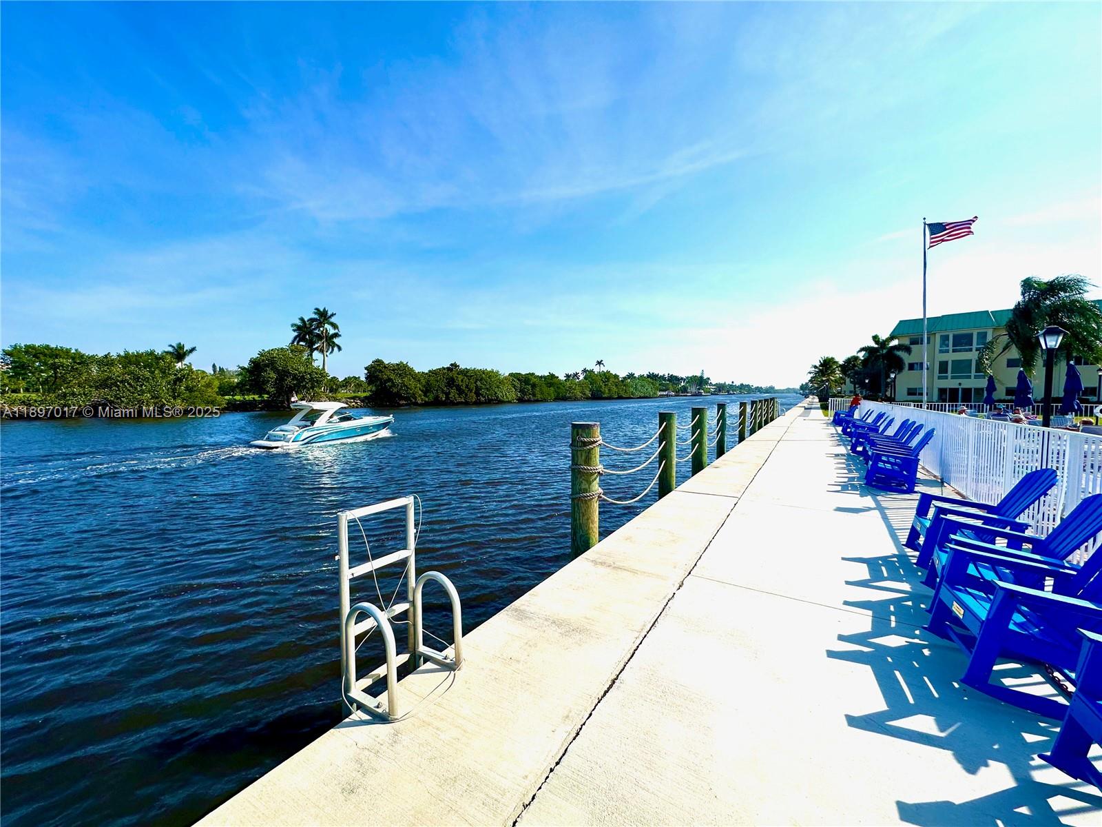 35 Colonial Club Drive, Unit 203 Boynton Beach, FL 33435 - Photo 21 of 29 a view of a terrace with sitting area