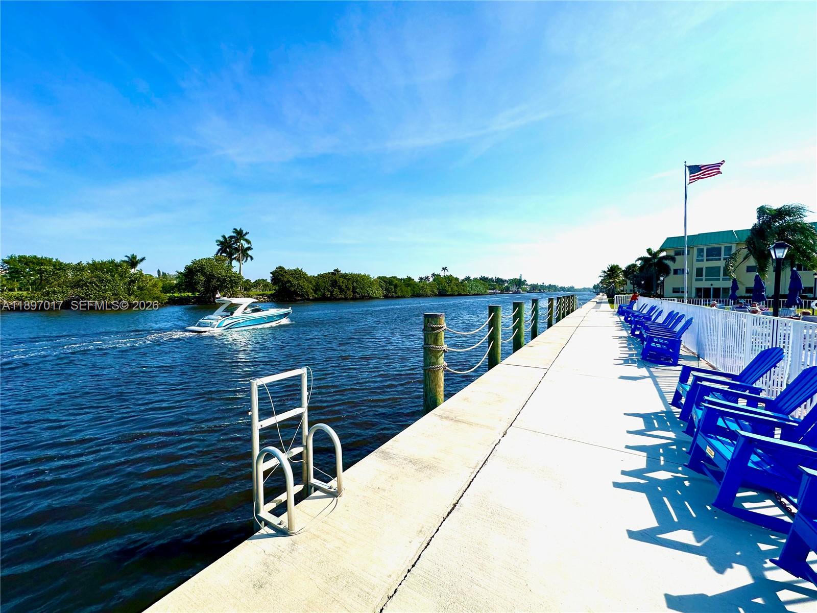 35 Colonial Club Drive, Unit 203 Boynton Beach, FL 33435 - Photo 4 of 29 a view of a terrace with sitting area