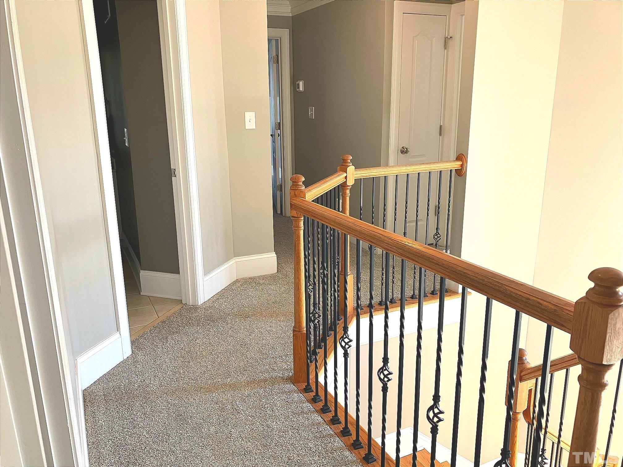 7733 Pegram Street Willow Spring, NC 27592 - Photo 22 of 34 a view of a porch with wooden floor