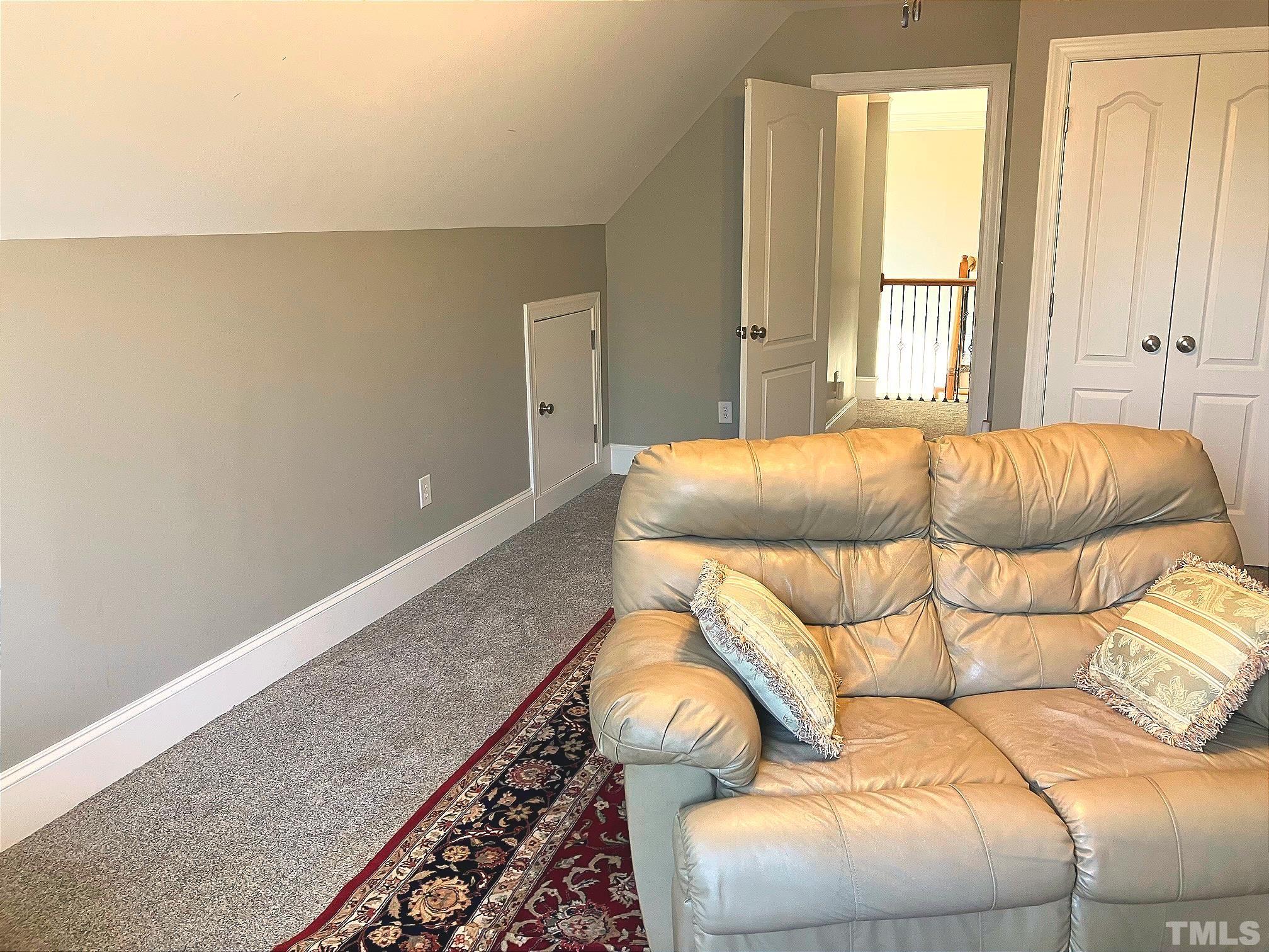 7733 Pegram Street Willow Spring, NC 27592 - Photo 29 of 34 a bedroom with a bed and window