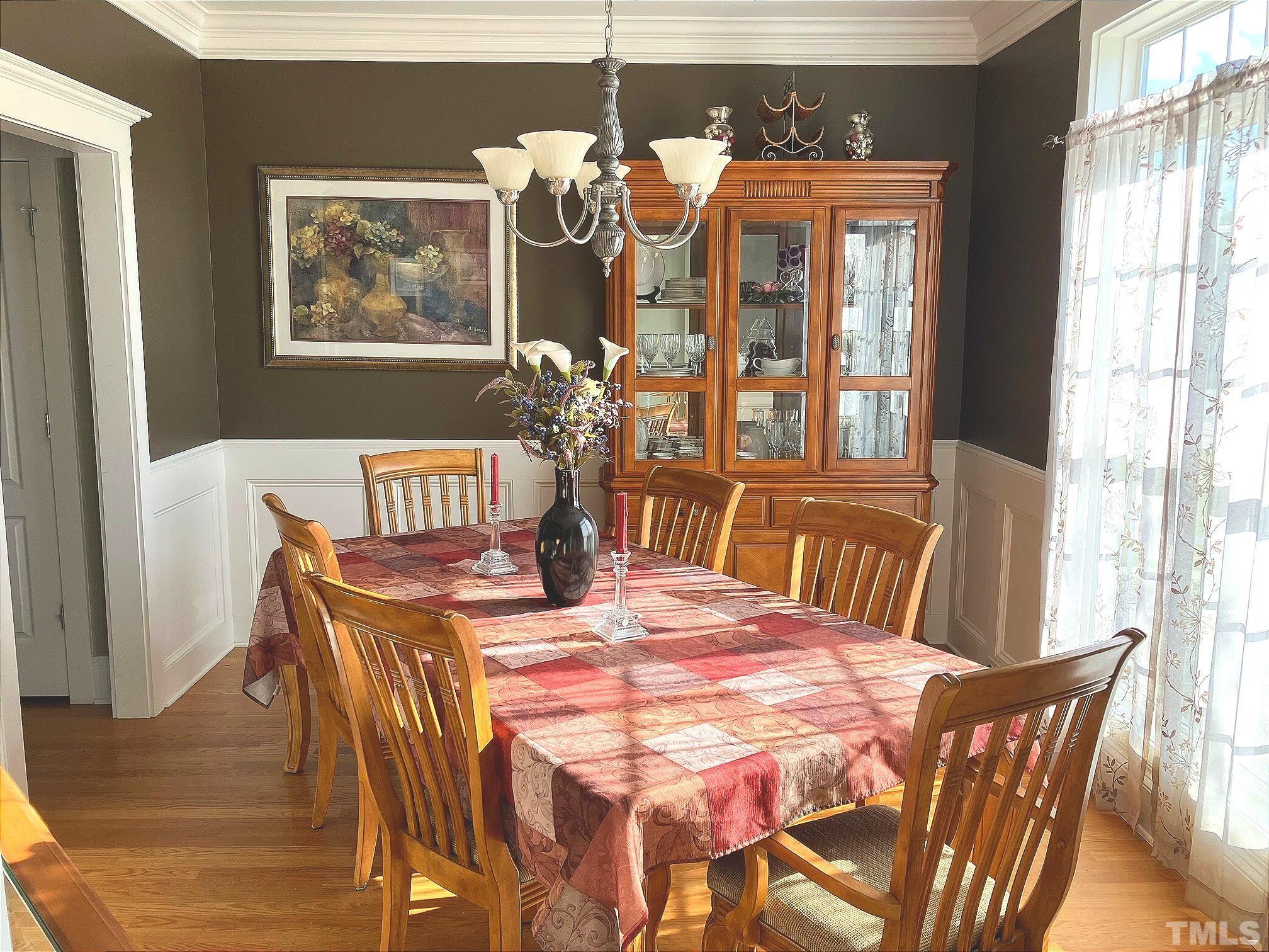 7733 Pegram Street Willow Spring, NC 27592 - Photo 3 of 34 a view of a dining room with furniture window and outside view