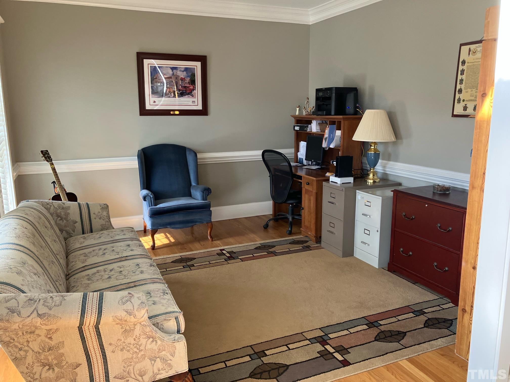7733 Pegram Street Willow Spring, NC 27592 - Photo 6 of 34 a living room with furniture