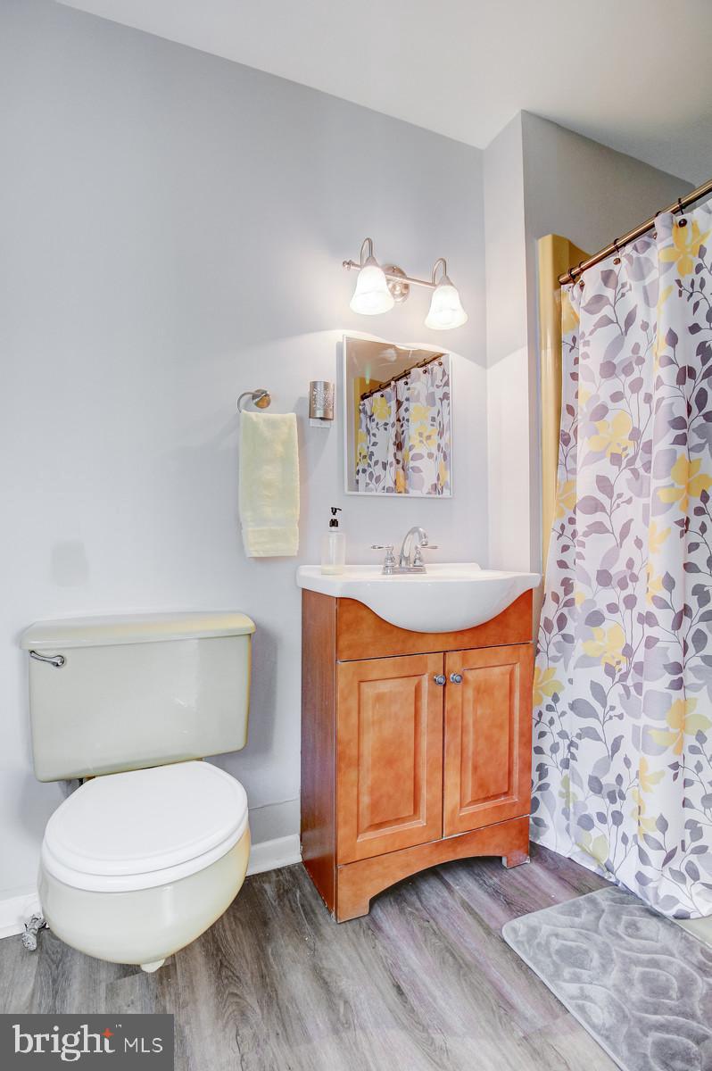 331 Juliustown Road Columbus, NJ 08022 - Photo 17 of 26 a bathroom with a toilet sink and mirror