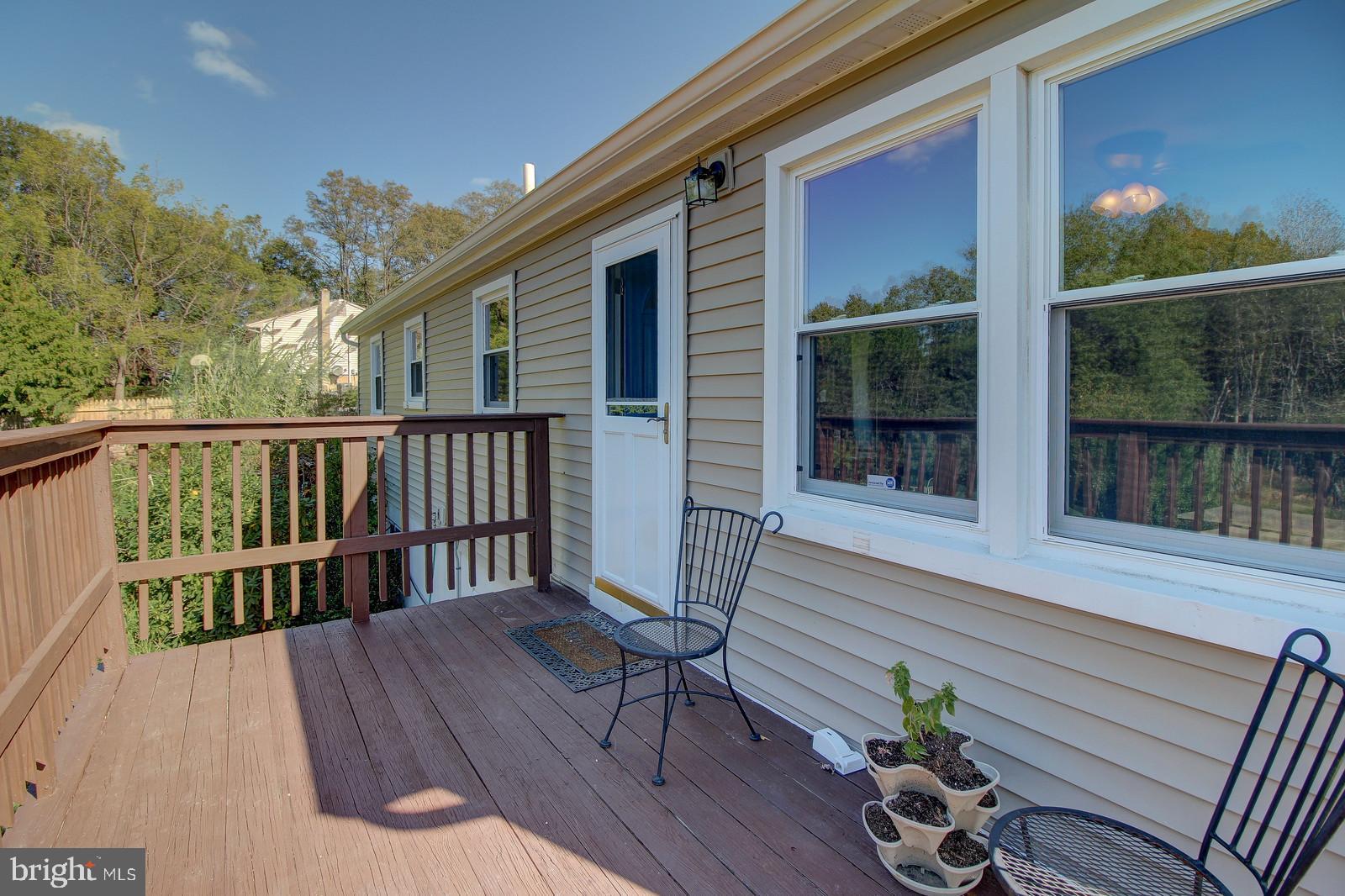 331 Juliustown Road Columbus, NJ 08022 - Photo 21 of 26 a view of a wooden chairs on the deck