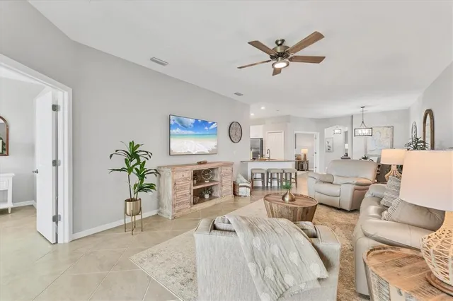 a living room with furniture and a table