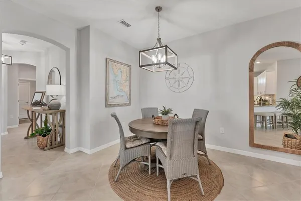 a view of a dining room with furniture