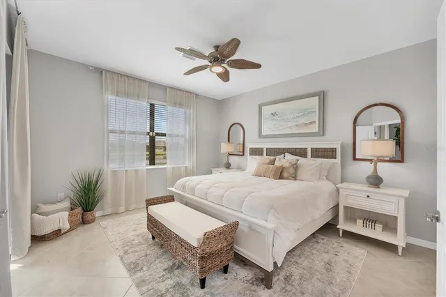 a bedroom with bed and a window