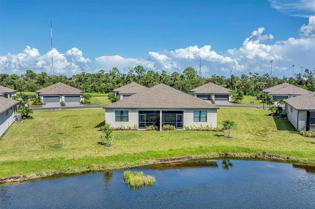 a view of a house with a big yard