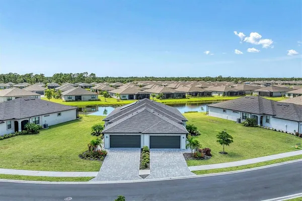 a view of a house with a swimming pool