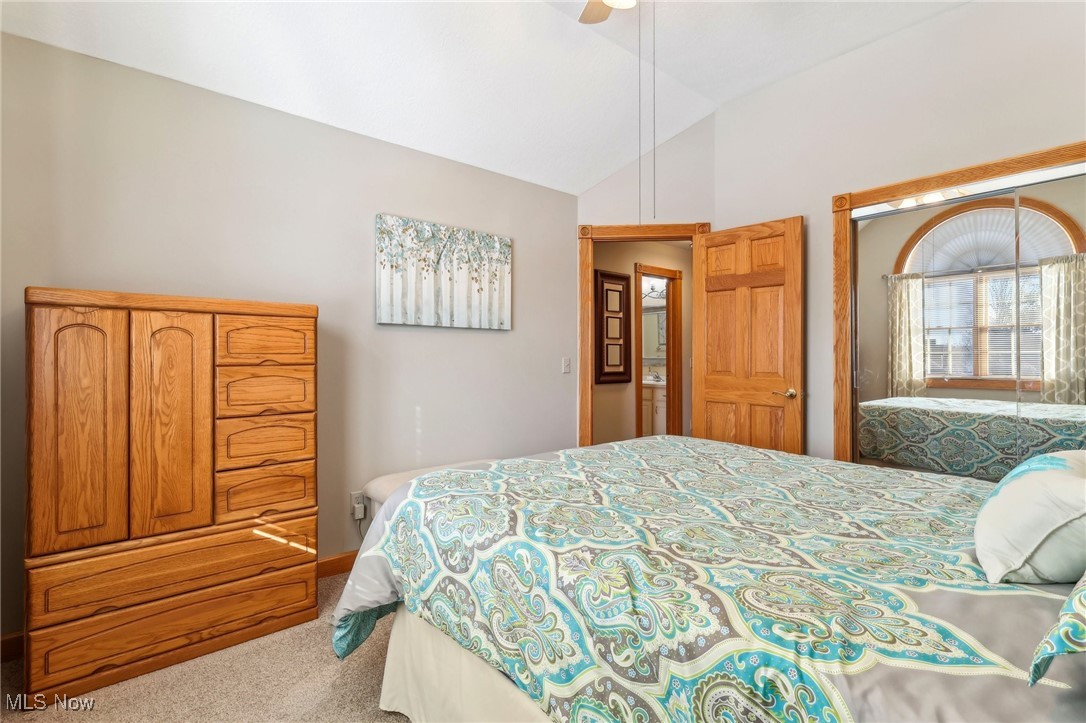 3353 Jens Way Perry, OH 44081 - Photo 30 of 49 Carpeted bedroom featuring ceiling fan and lofted ceiling