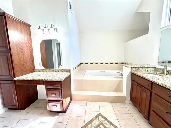 a utility room with a sink a washer and dryer