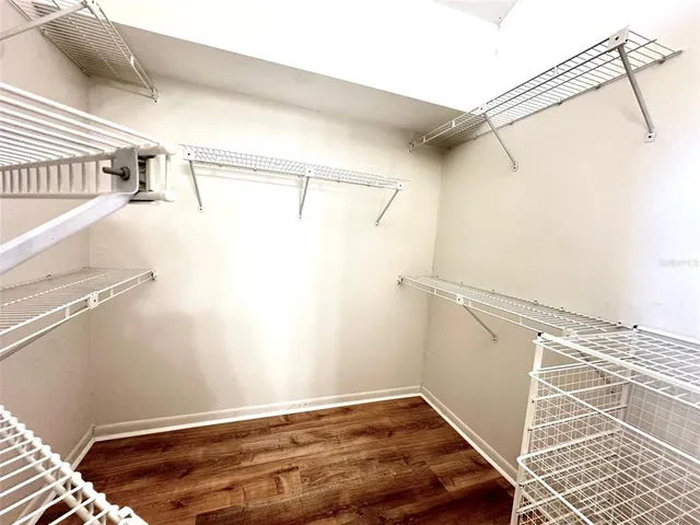 a view of a room with racks on the wall