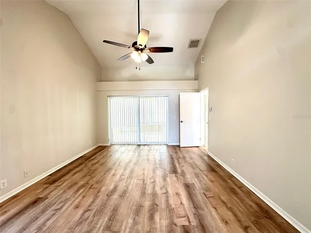 a view of an empty room with a window