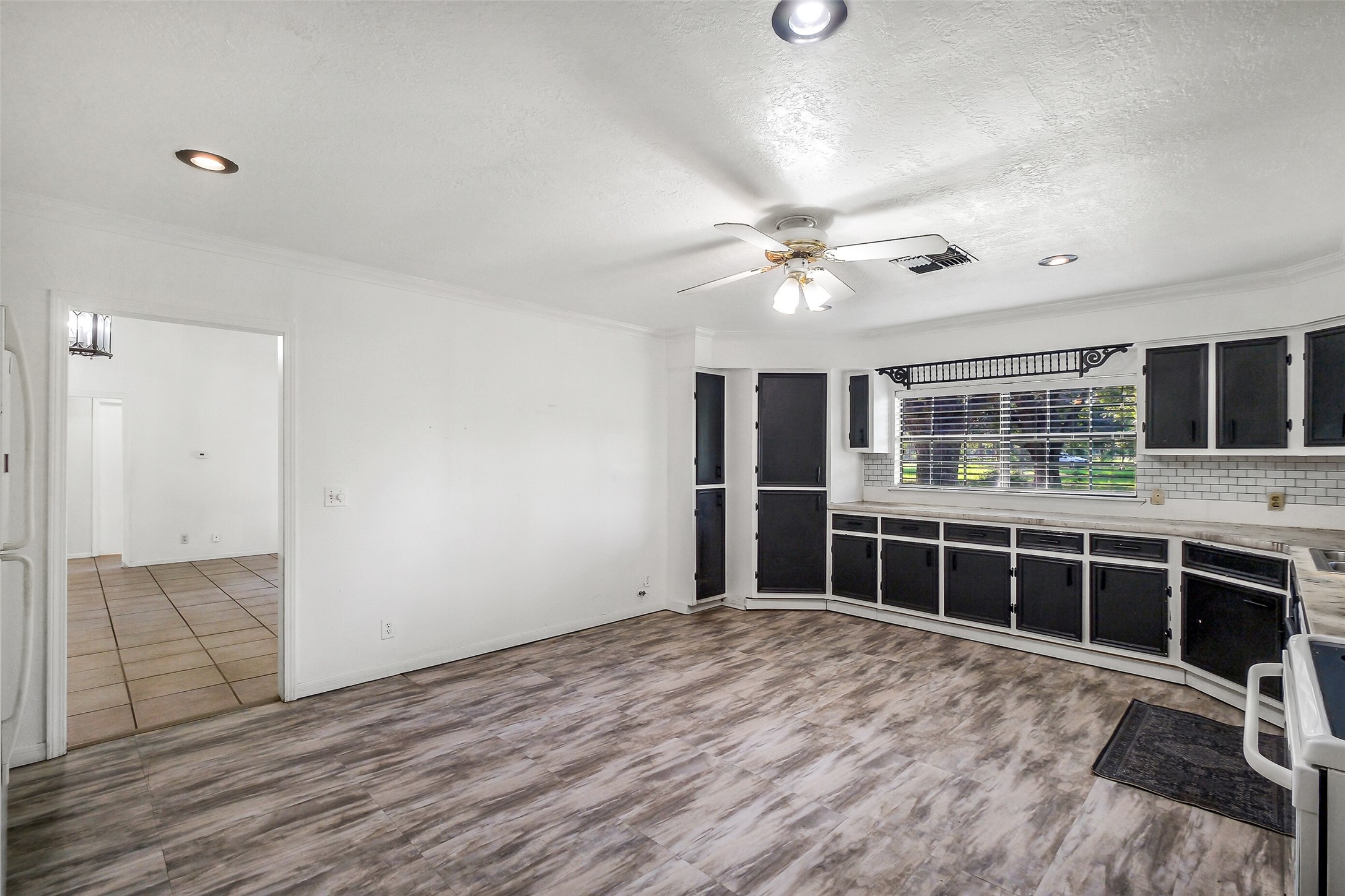 9503 Cardinal Road Beasley, TX 77417 - Photo 8 of 27 a view of workspace with wooden floor and window