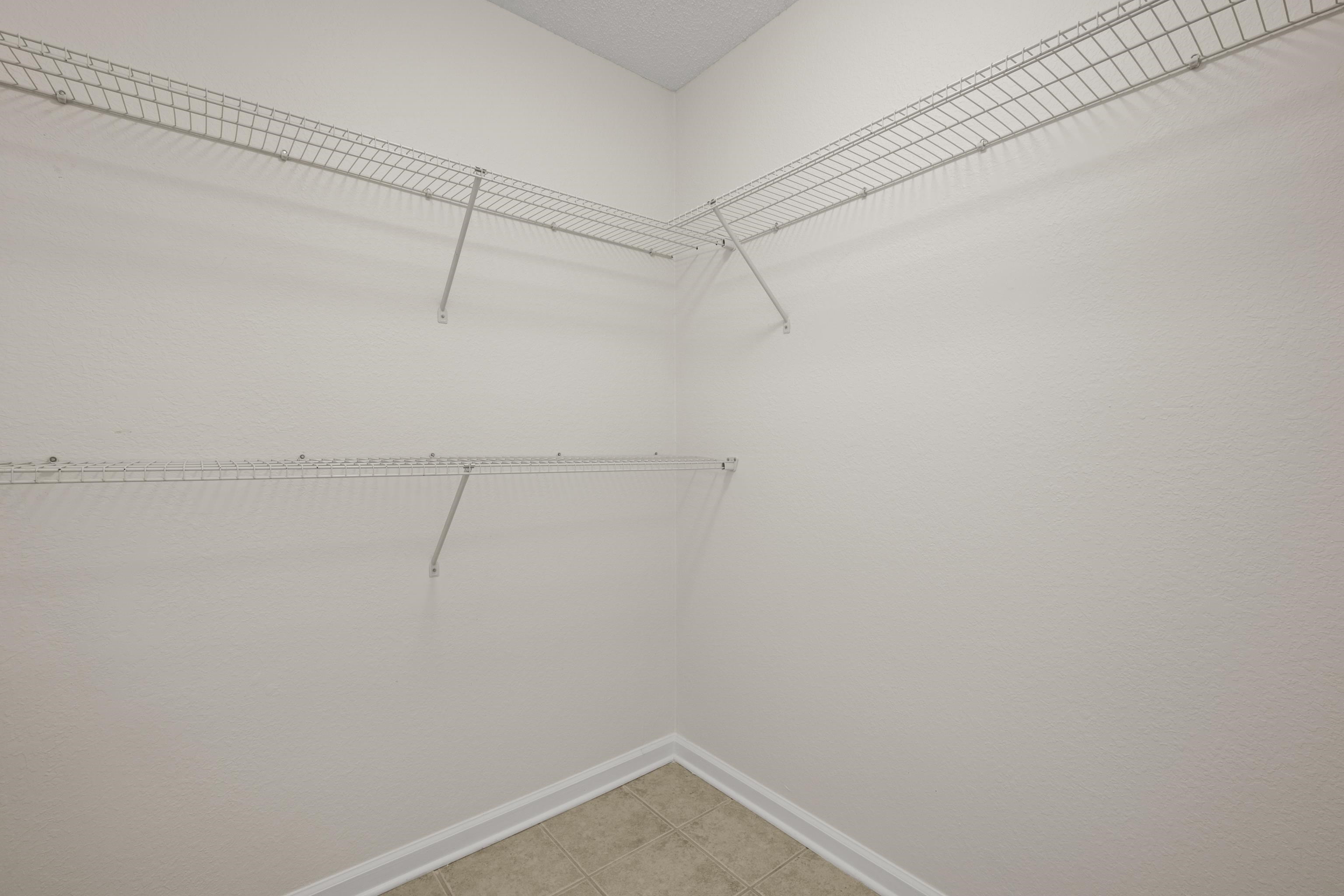 8016 Cale Falls Lane Bartlett, TN 38002 - Photo 21 of 37 a view of a room with racks on the wall