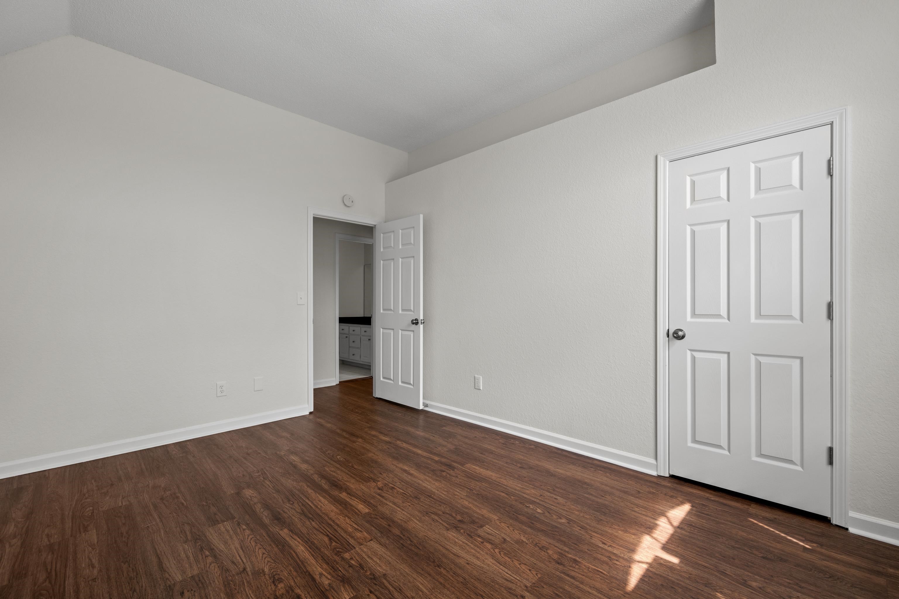 8016 Cale Falls Lane Bartlett, TN 38002 - Photo 23 of 37 a view of an empty room with wooden floor