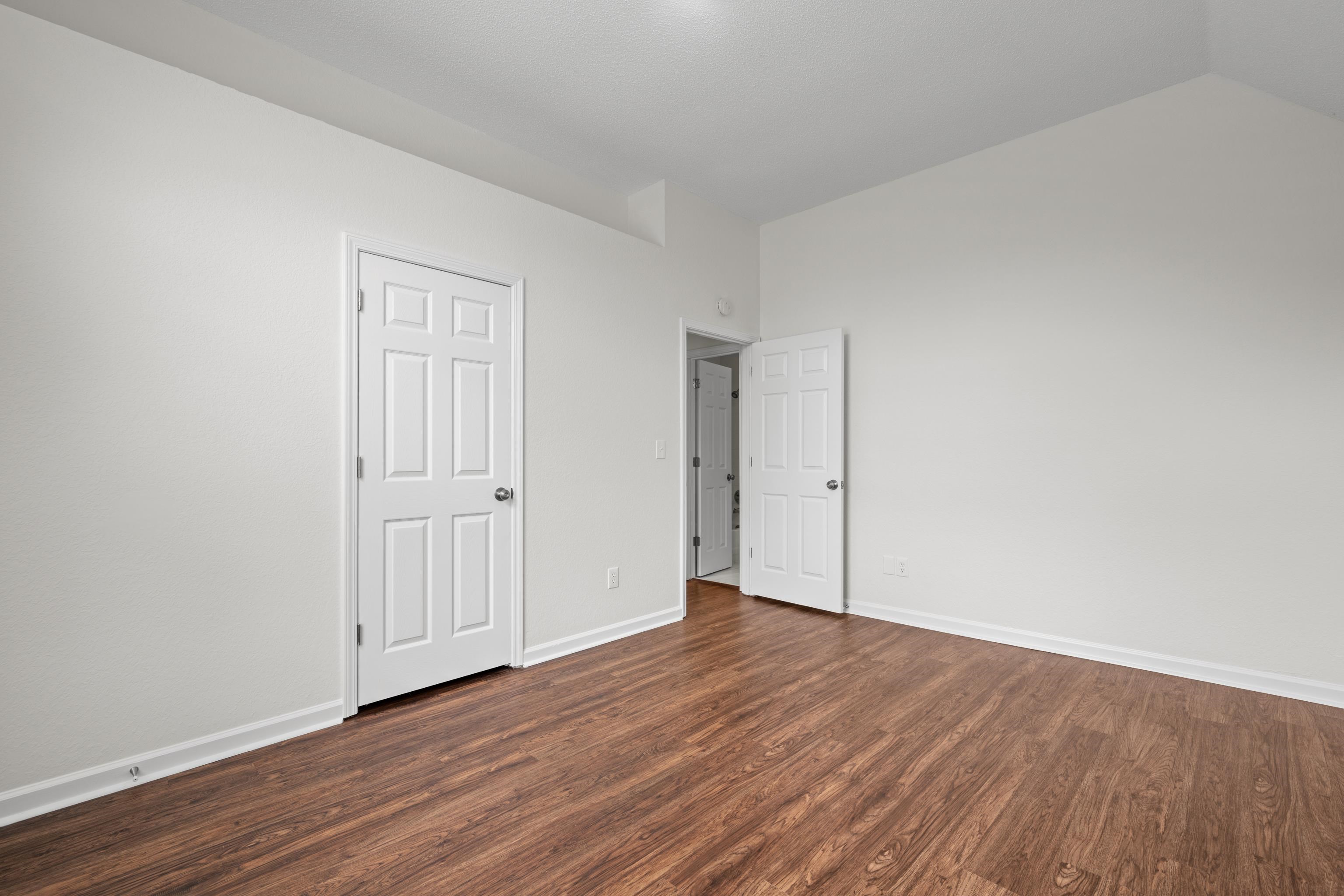 8016 Cale Falls Lane Bartlett, TN 38002 - Photo 26 of 37 a view of an empty room with wooden floor