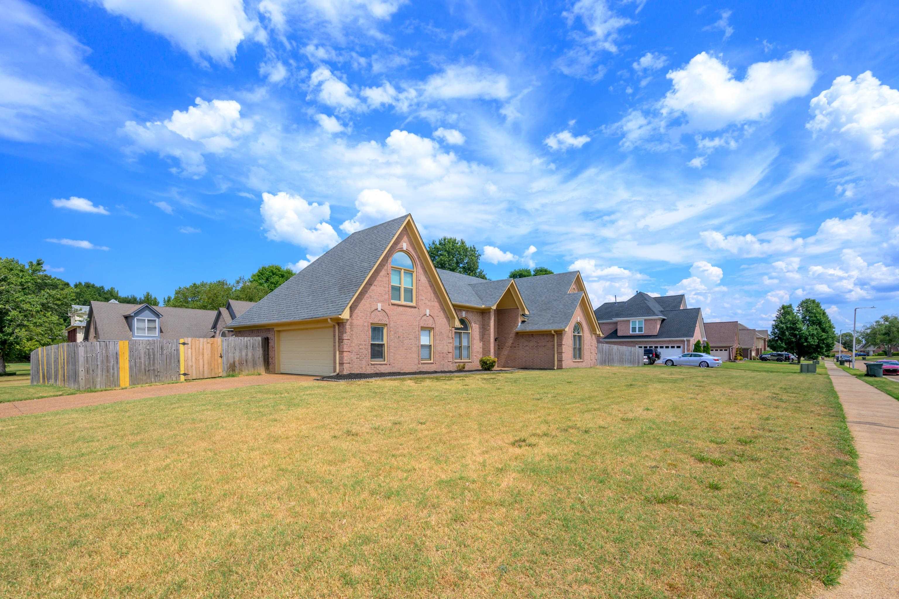 8016 Cale Falls Lane Bartlett, TN 38002 - Photo 33 of 37 a view of a house with swimming pool and sitting area