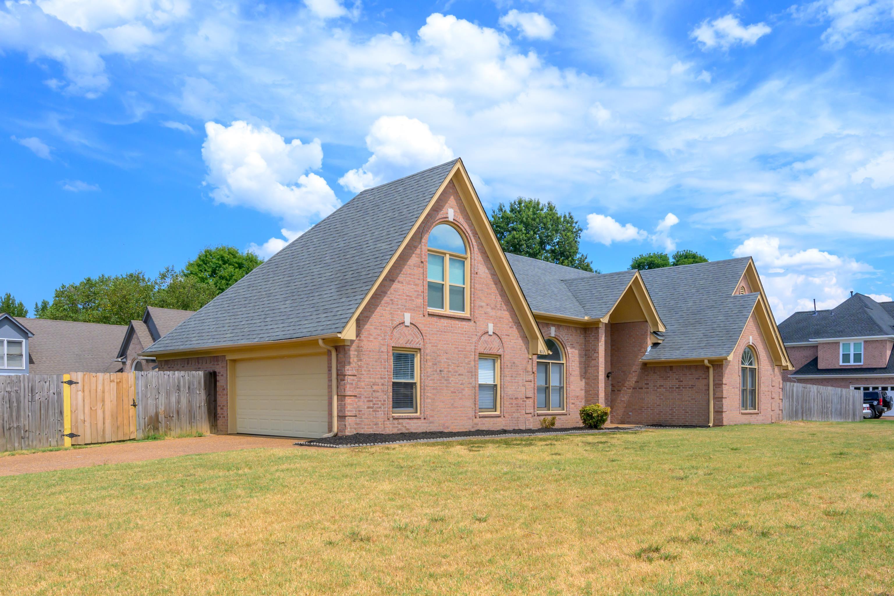 8016 Cale Falls Lane Bartlett, TN 38002 - Photo 34 of 37 a view of a house with backyard and garden