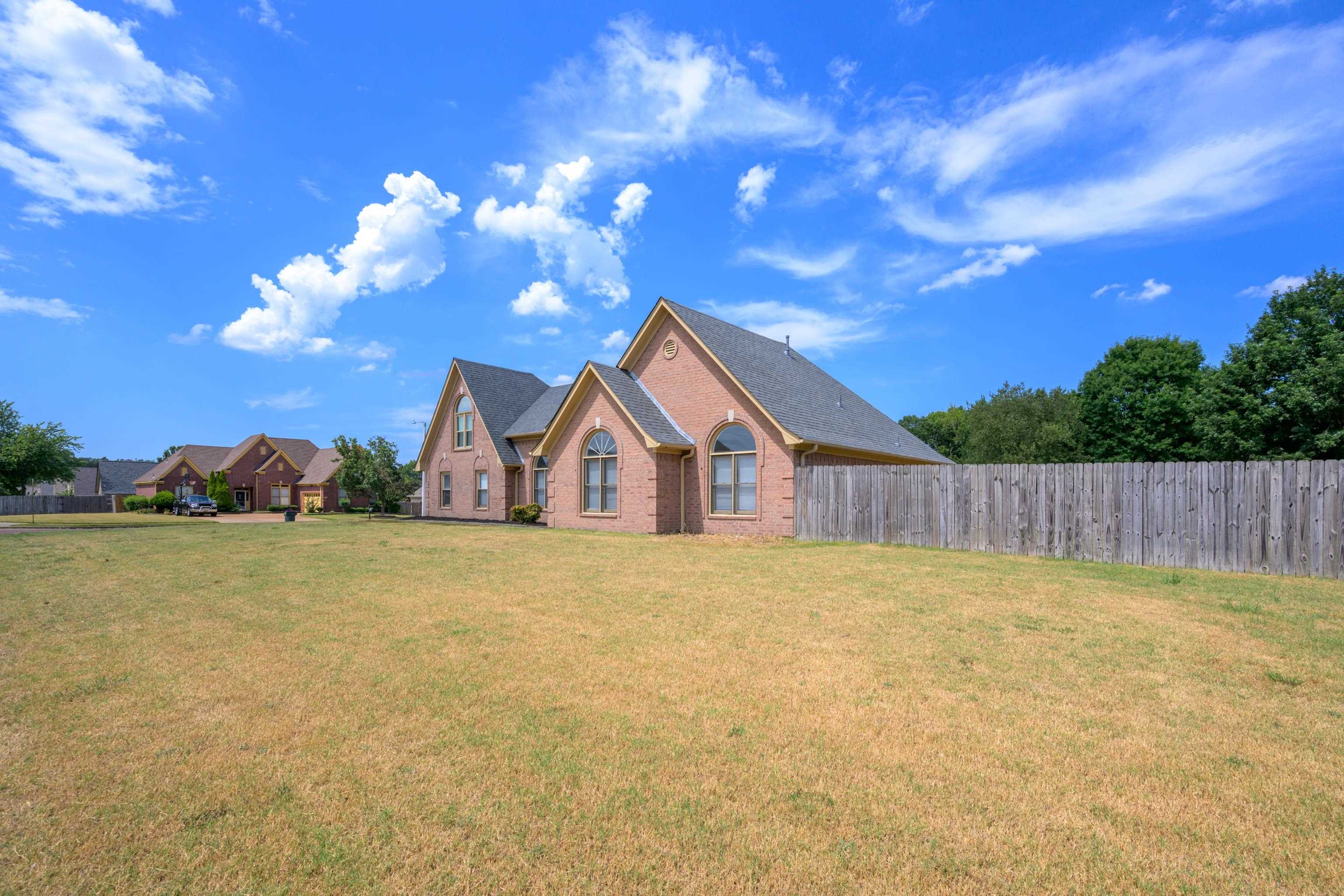 8016 Cale Falls Lane Bartlett, TN 38002 - Photo 36 of 37 a view of a house with a yard and entertaining space