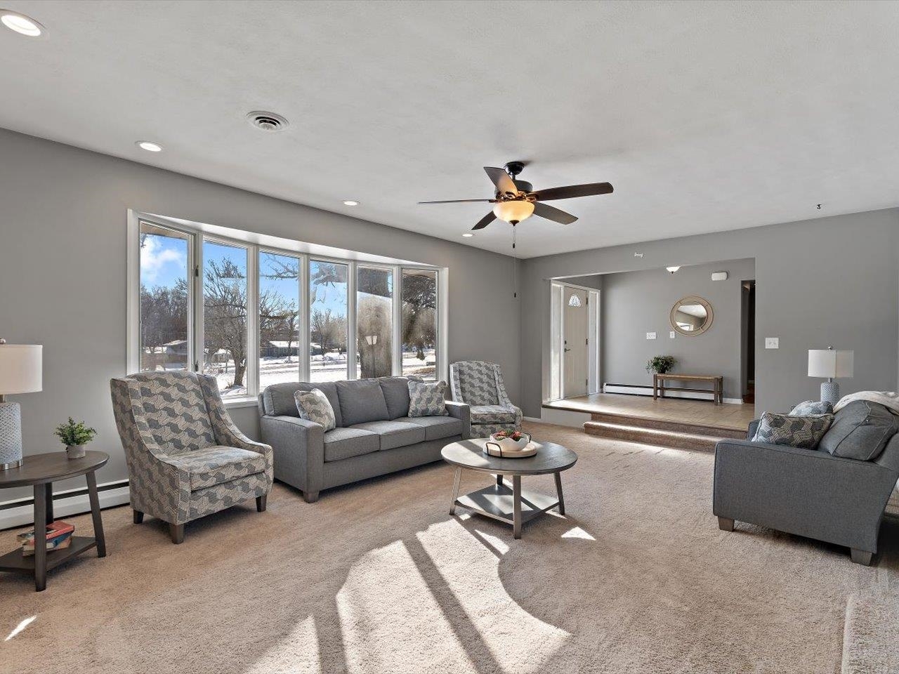 8210 Ridgewood Road Rock Island, IL 61201 - Photo 12 of 60 a living room with furniture and a large window