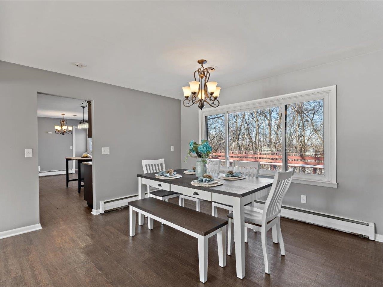 8210 Ridgewood Road Rock Island, IL 61201 - Photo 17 of 60 a view of a dining room with furniture and window