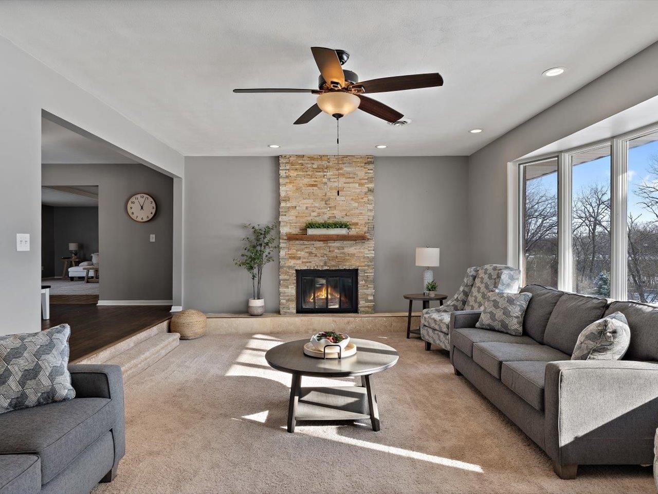 8210 Ridgewood Road Rock Island, IL 61201 - Photo 9 of 60 a living room with furniture and a fireplace