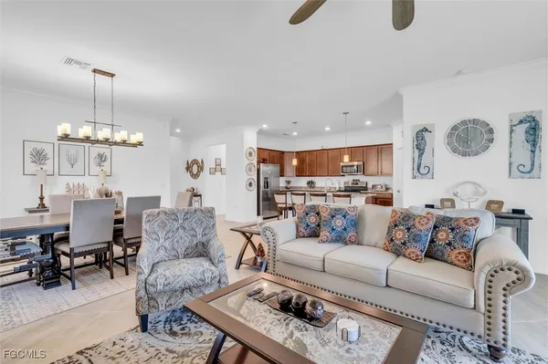 a kitchen with center island table and chairs in it