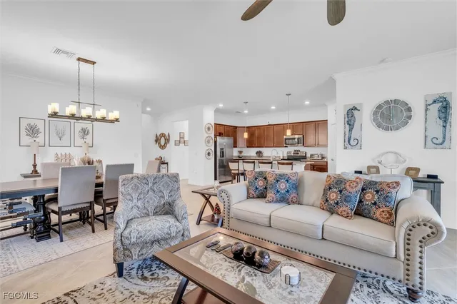 a kitchen with center island table and chairs in it