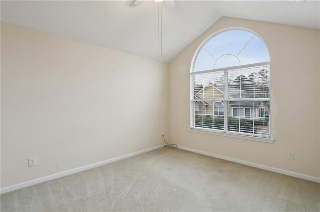 2191 Rockbridge Road Southwest, Unit 1301 Stone Mountain, GA 30087 - Photo 18 of 22 an empty room with a window