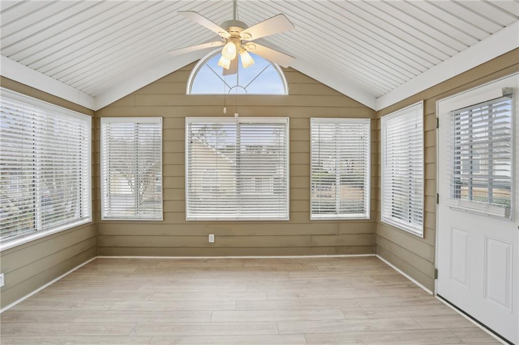 2191 Rockbridge Road Southwest, Unit 1301 Stone Mountain, GA 30087 - Photo 7 of 22 a view of an empty room with a window