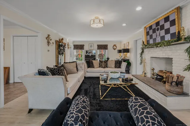 a bathroom with a sink mirror and toilet