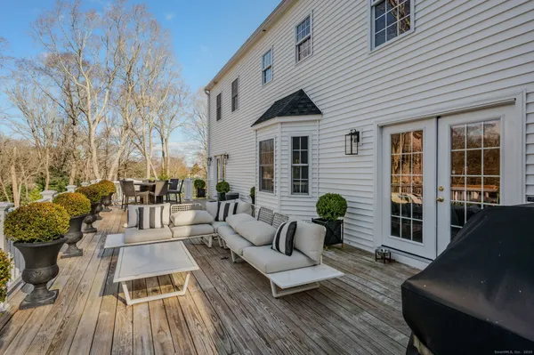 a view of a yard with sitting area