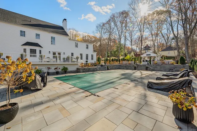 a group of people sitting in living area of a building