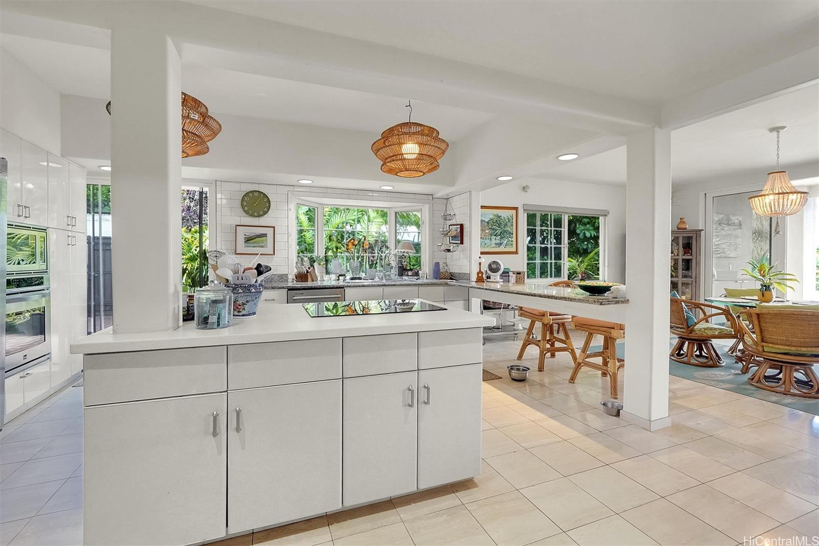 469 Portlock Road Honolulu, HI 96825 - Photo 13 of 25 a kitchen with stainless steel appliances granite countertop a refrigerator and a sink