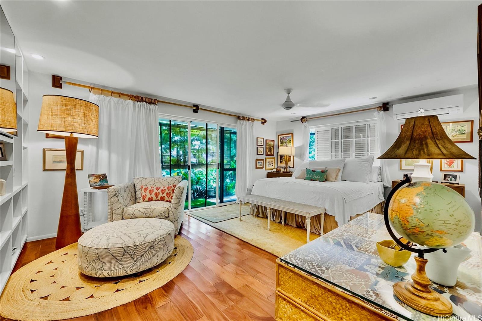 469 Portlock Road Honolulu, HI 96825 - Photo 16 of 25 a living room with furniture and a fireplace