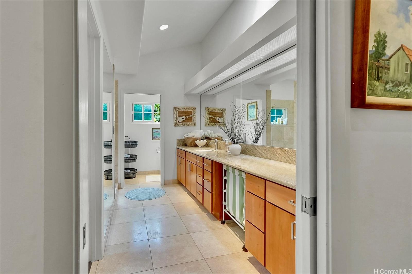 469 Portlock Road Honolulu, HI 96825 - Photo 18 of 25 a kitchen with stainless steel appliances granite countertop a refrigerator and a stove