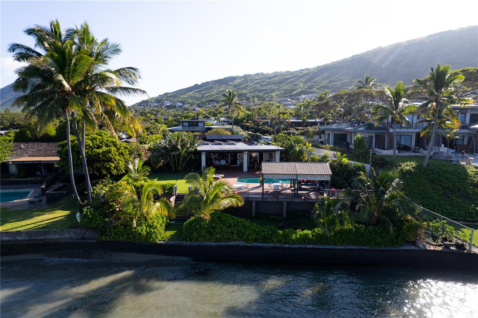 469 Portlock Road Honolulu, HI 96825 - Photo 21 of 25 a front view of a house with a yard