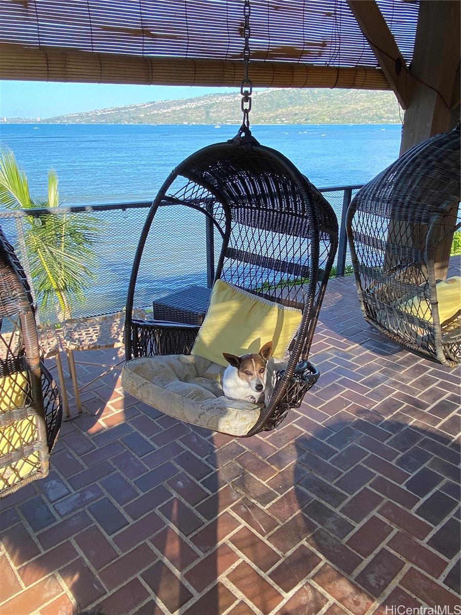 469 Portlock Road, Unit A Honolulu, HI 96825 - Photo 25 of 25 a view of a swimming pool with seating space