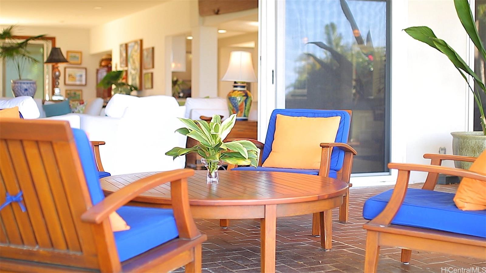 469 Portlock Road Honolulu, HI 96825 - Photo 6 of 25 a view of a dining room with furniture and wooden floor