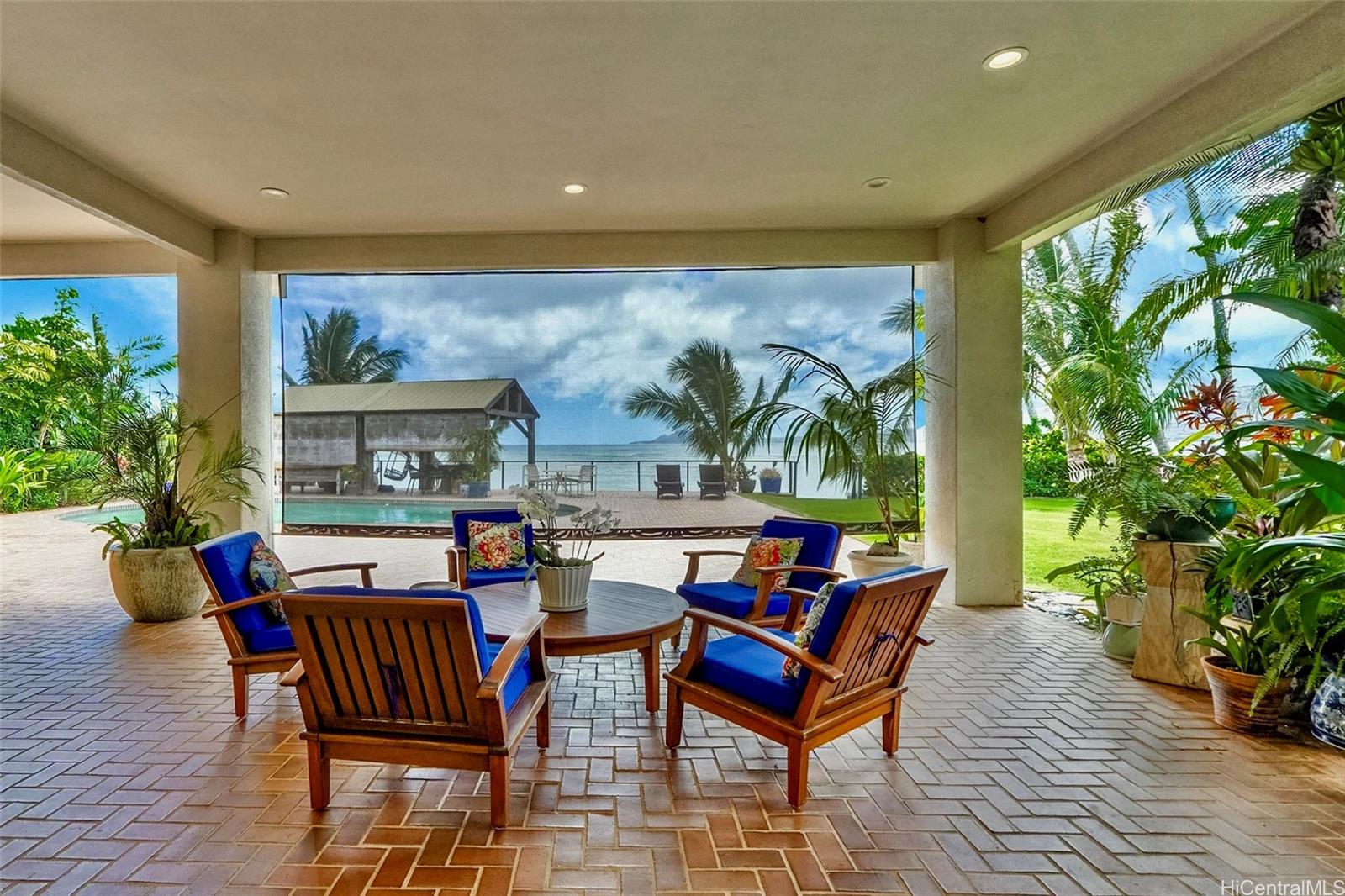 469 Portlock Road, Unit A Honolulu, HI 96825 - Photo 7 of 25 a outdoor living space with furniture and garden view