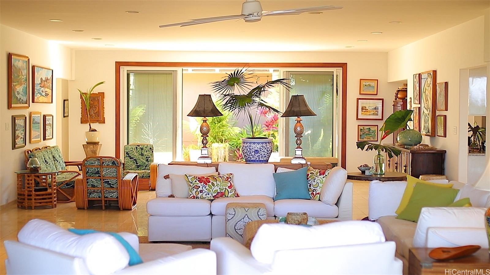 469 Portlock Road, Unit A Honolulu, HI 96825 - Photo 8 of 25 a living room with furniture and a large window